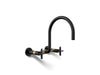 KOHLER K-28672-3 Billet Two-hole wall-mount bridge kitchen sink faucet, matte black with brushed moderne brass
