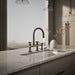 KOHLER K-28673-3 Billet Two-hole bridge kitchen sink faucet with side sprayer, matte black with brushed moderne brass -...